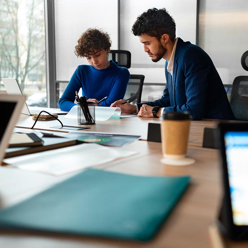 Am image of two people working together in an office | IT Emergency Support in Falkirk